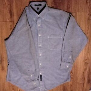 Light blue oxford button down long sleeve shirt.